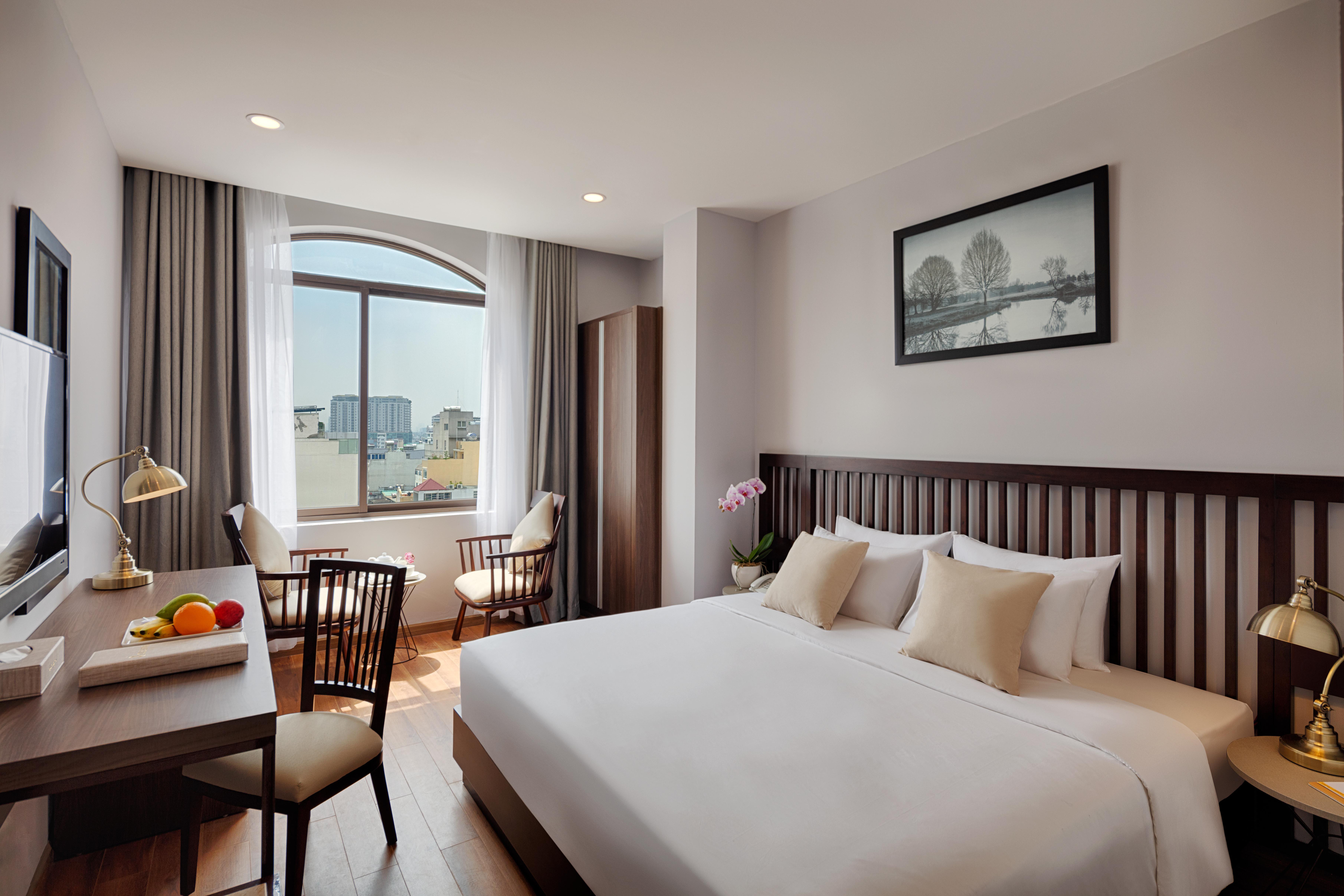 Happy Life Grand Hotel & Rooftop Skybar Хошимін Екстер'єр фото